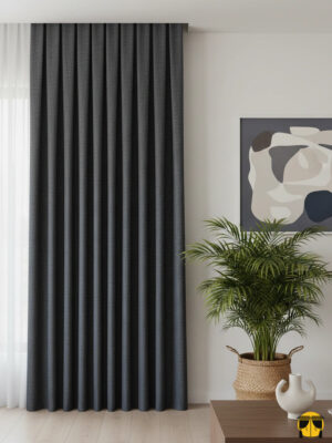 "Modern salon dekorasyonunda, tavandan yere kadar uzanan, füme rengi, düz Armida keten dokulu, tok dökümlü şık fon perde."