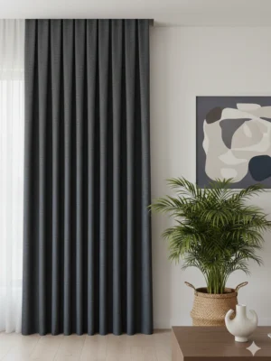 "Modern salon dekorasyonunda, tavandan yere kadar uzanan, füme rengi, düz Armida keten dokulu, tok dökümlü şık fon perde."