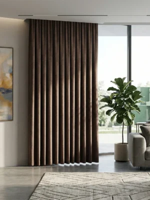 Modern bir yatak odasında, güneş ışığını tamamen bloke ederek huzurlu bir uyku ortamı yaratan, tok dökümlü ve mat kahverengi blackout fon perde.