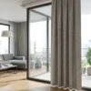 "Modern minimalist dekorasyon anlayışına uygun, gün ışığını yumuşakça süzerek odayı ferah gösteren kaliteli bej kahve perde görseli."