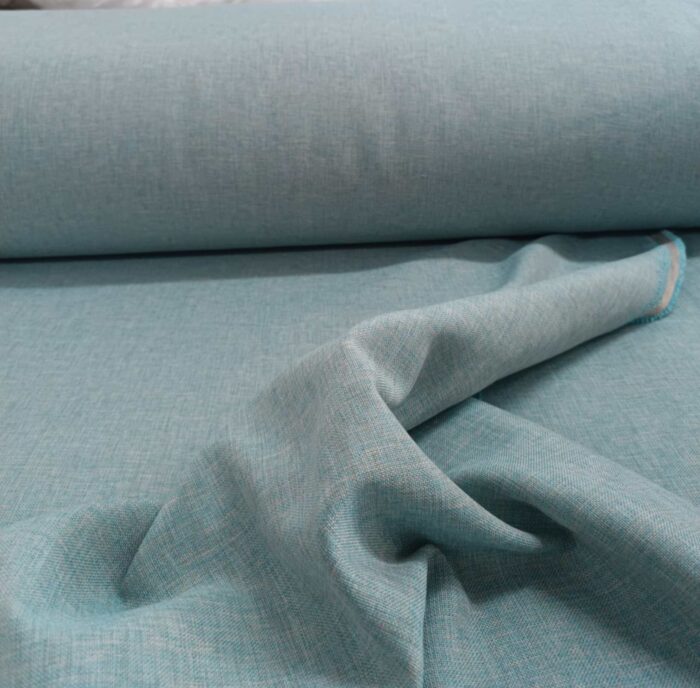 "Kırışmaya dayanıklı yapısı ve nefes alan kaliteli keten dokusuyla yatak odaları için ideal, ütü gerektirmeyen premium mint yeşili fon perde detayı."